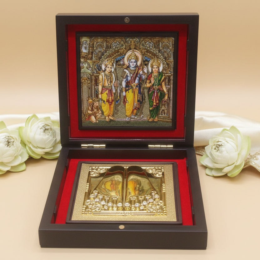 Decorative box with religious artwork on a beige background